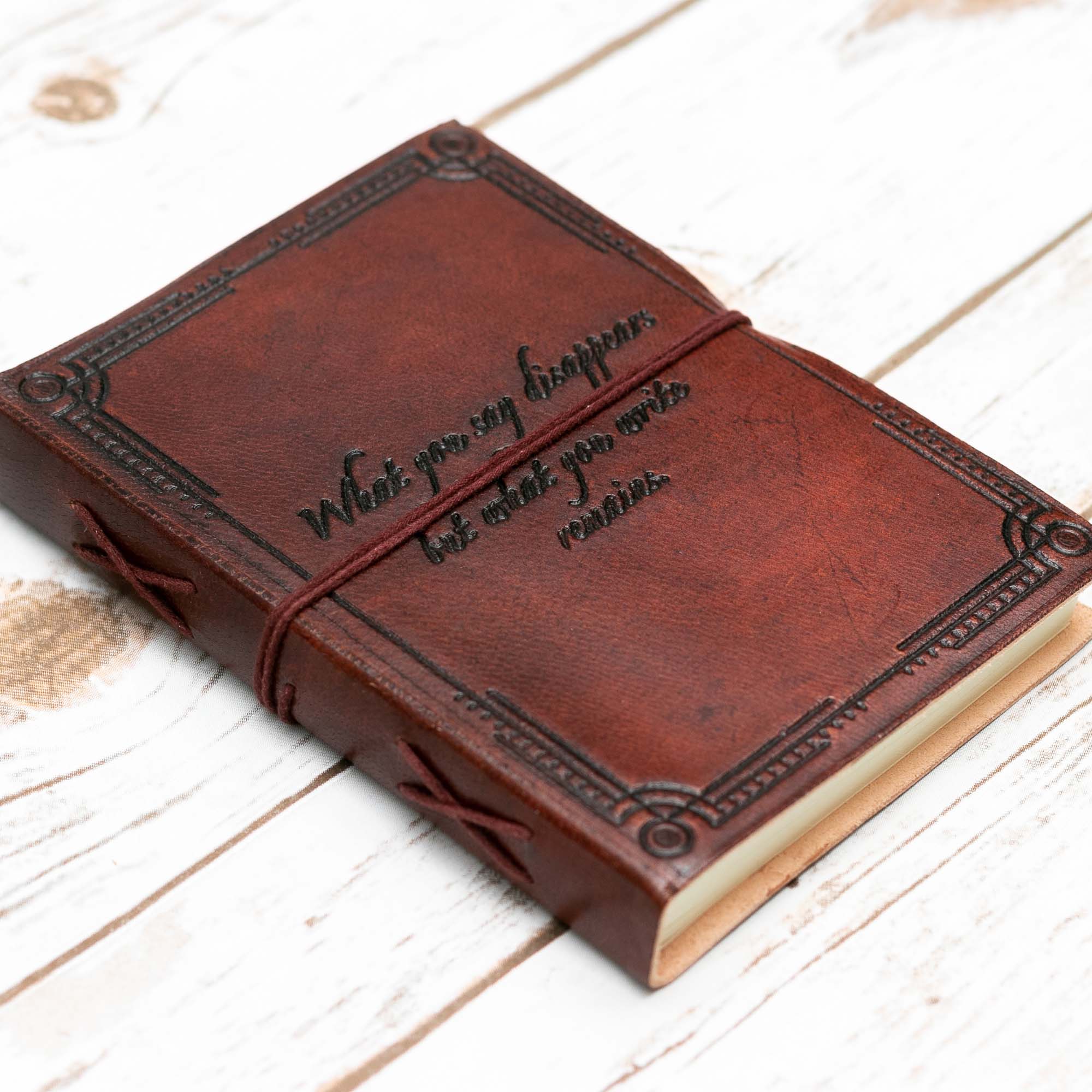 Leather Journal - Quote - &quot;What you write remains...